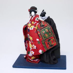 two-dolls-wearing-kimonos two small dolls, wearing kimonos
